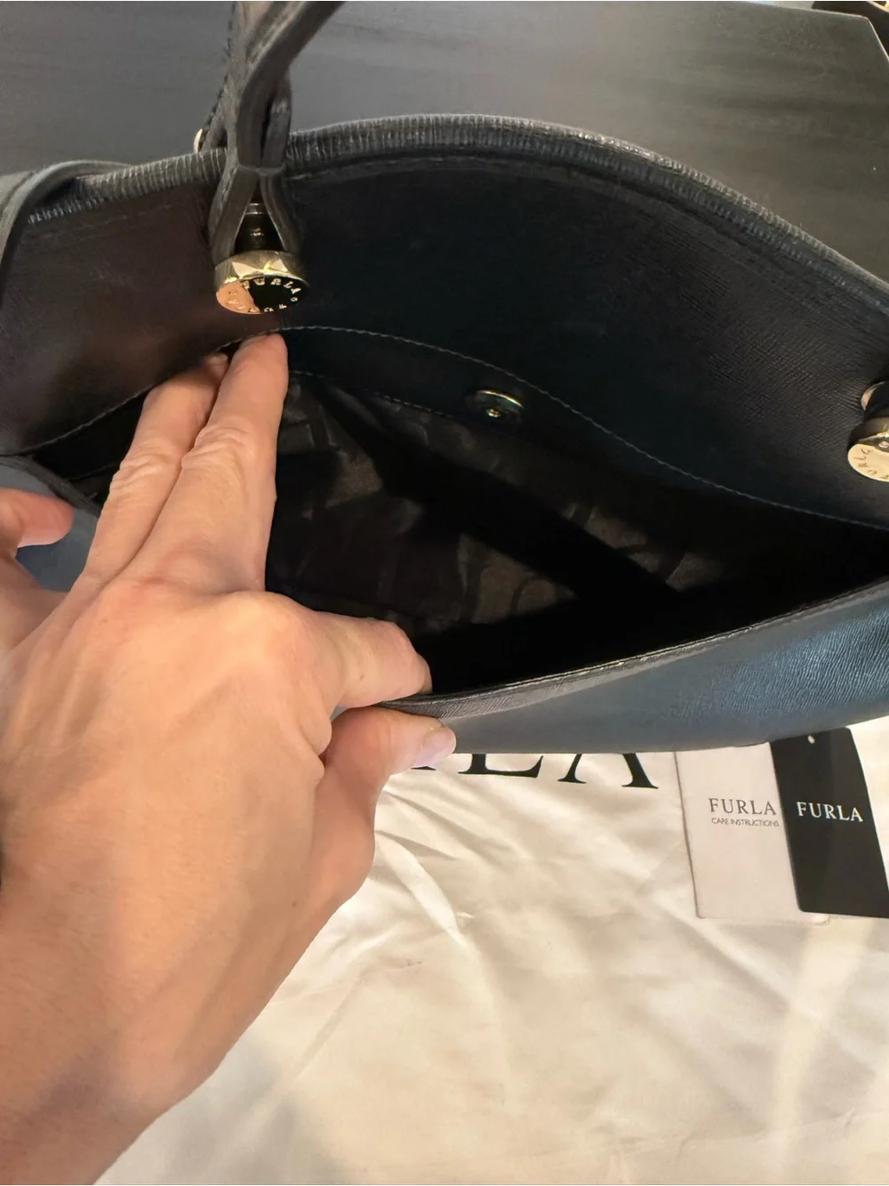Furla downsizing figured